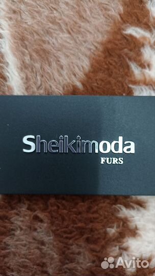 Трикотажный костюм с юбкой женский 46