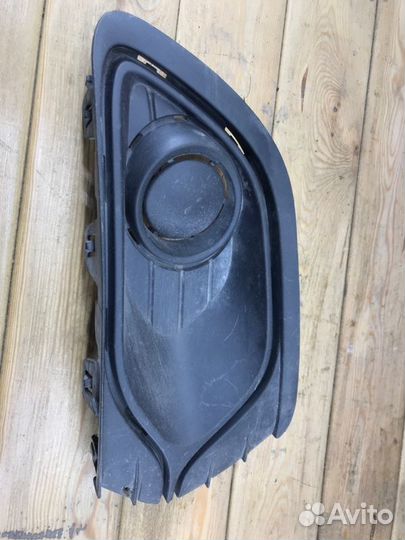 Накладка противотуманной фары правая Renault Logan