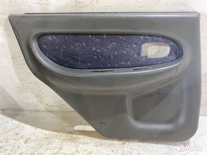 Обшивка боковой двери задняя левая Kia Spectra