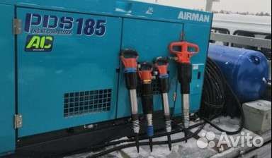 Компрессор с отбойными молотками