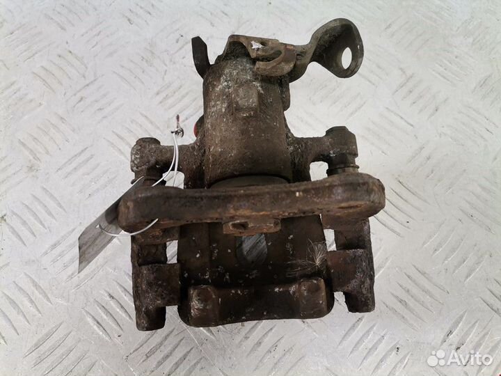 Суппорт задний правый Renault Modus 2004