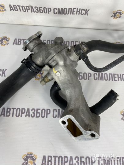 Корпус термостата Kia Carnival J3