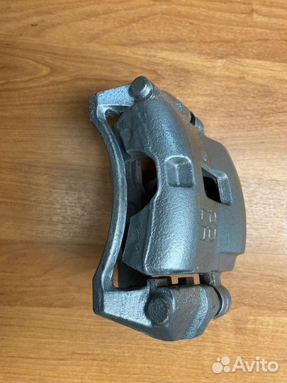 Суппорт тормозной перед левый spectra K0BB149990