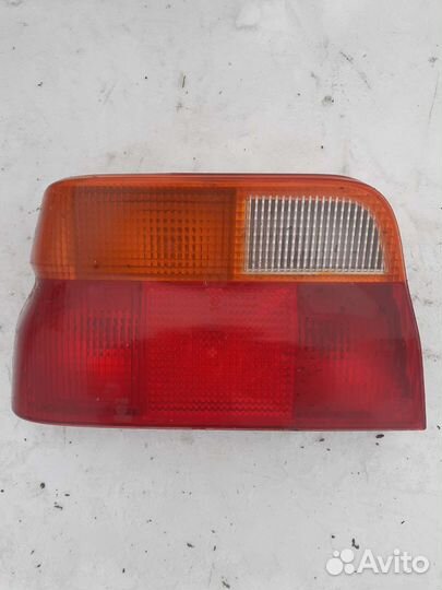 Задний левый фонарь Ford Escort