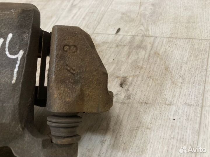 Суппорт передний левый Mitsubishi Lancer 9 CS3A