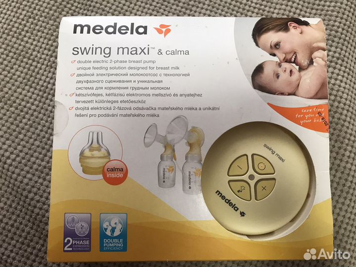 Молокоотсос medela swing maxi