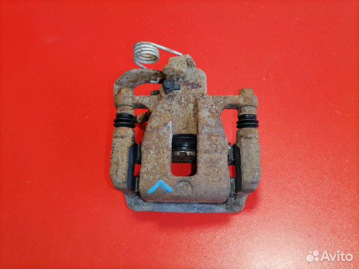 Суппорт задний левый Hyundai Solaris RB G4FA 2011