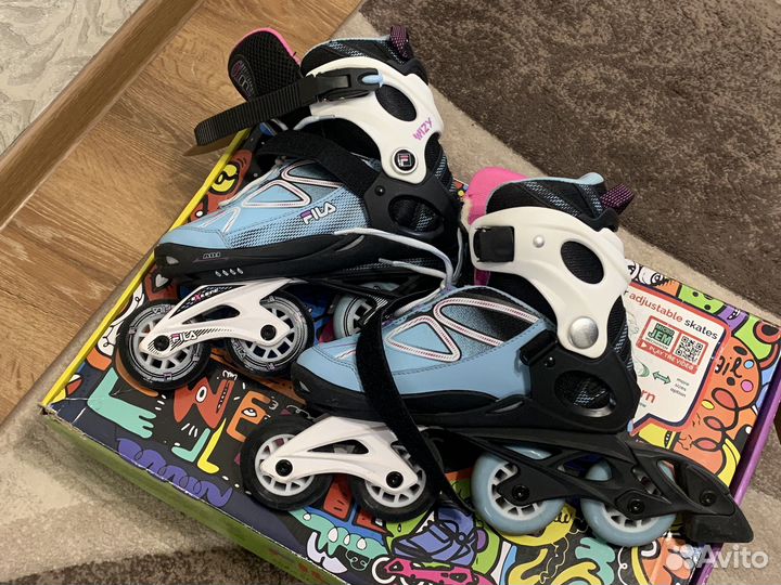 Роликовые коньки