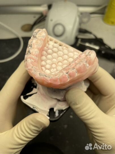 Зубной техник