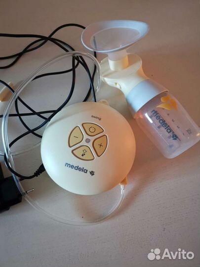 Молокоотсос medela swing flex электрический