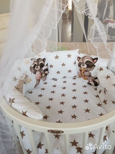 Детская круглая кроватка с маятником