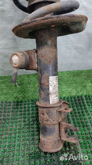 Стойка амортизатора передняя левая Opel Corsa D 2