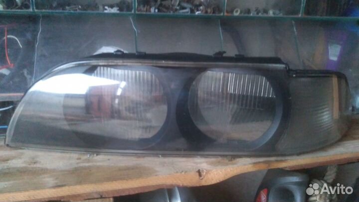 Стекло левой фары BMW 5 E39