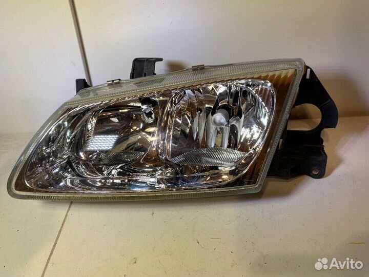Фара галогеновая левая Nissan Almera N16 2000-2007