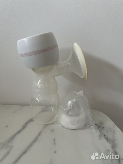 Молокоотсос электрический