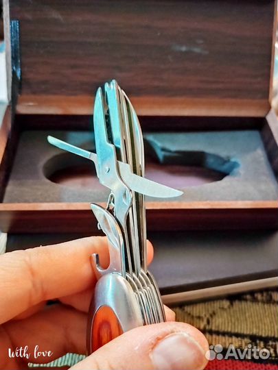 Нож раскладной многофункциональный