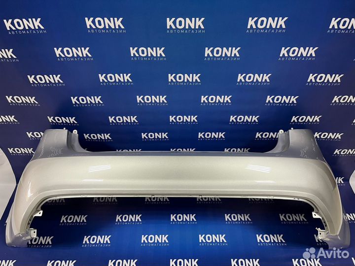 Задний серебристый бампер на Киа Рио 2010-2015