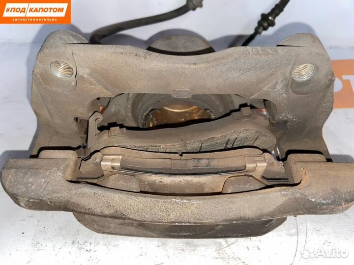 Суппорт тормозной передний левый Nissan X-Trail