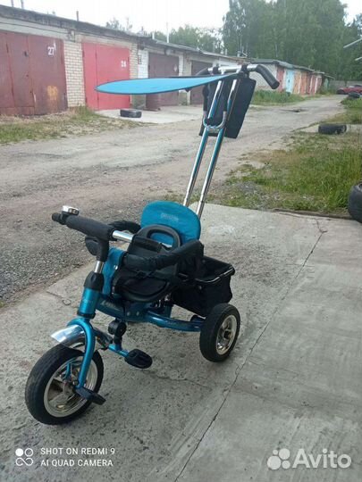 Детский трехколесный велосипед с ручкой