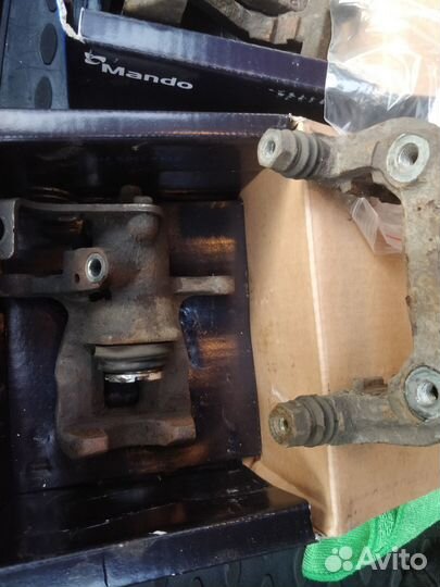 Суппорты задние левый и правый KIA RIO III