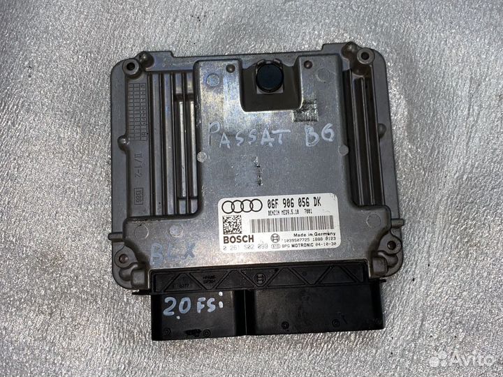 Эбу 06F906056DK Passat B6 2.0fsi BLX