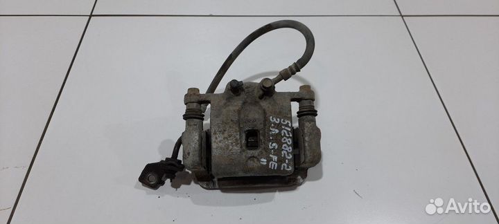 Суппорт задний левый (Hyundai Santa Fe)