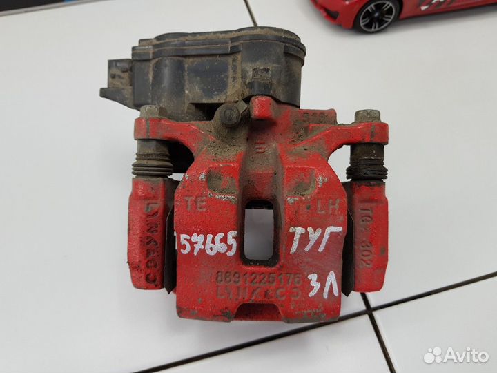 Суппорт задний левый (Geely Tugella)