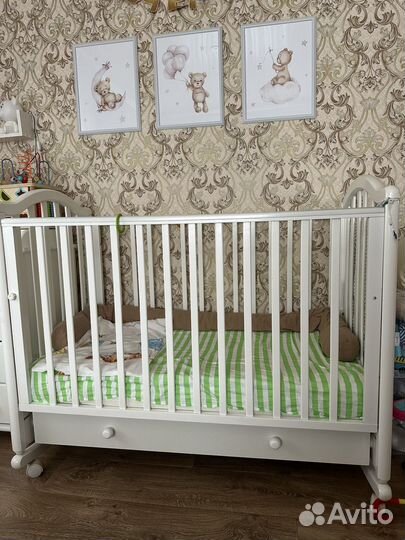 Детская кроватка с маятником гандылян