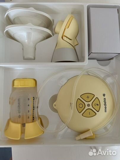 Молокоотсос medela электрический