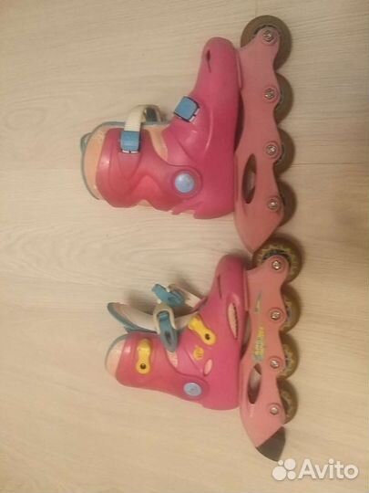 Роликовые коньки