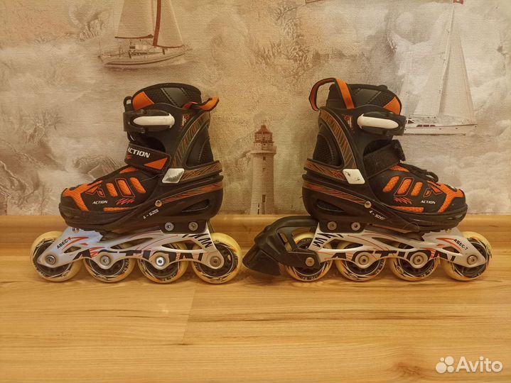 Роликовые коньки