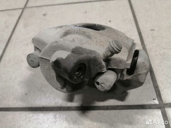 Суппорт тормозной передний правый Форд Фиеста