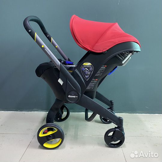 Автолюлька Doona Plus с базой Isofix красная