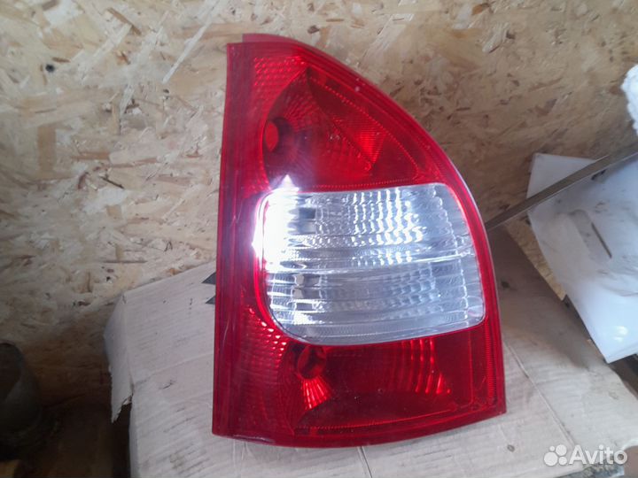 Фонарь задний левый калина универсал