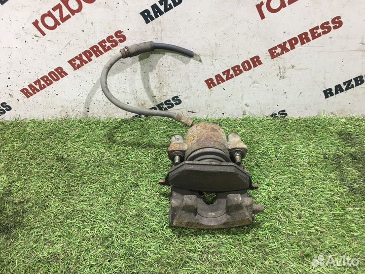 Суппорт тормозной передний левый Skoda Yeti