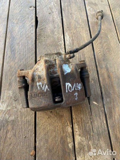 Суппорт передний левый Volkswagen Golf 3 1991-2000