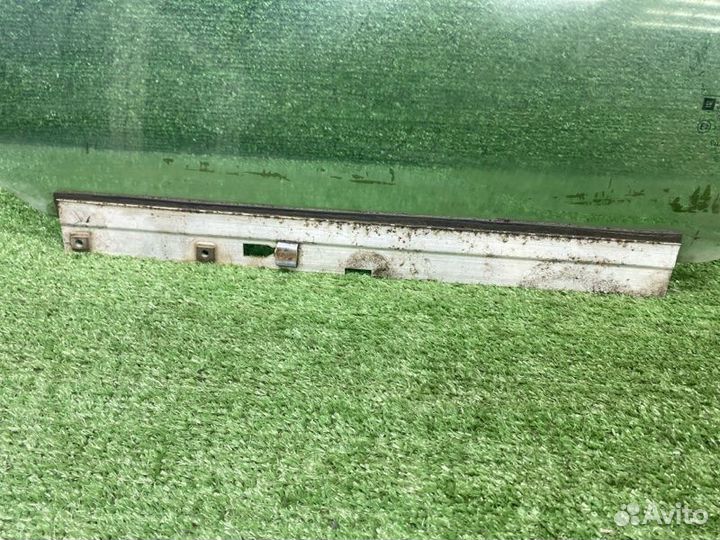 Стекло двери переднее левое Opel Astra G