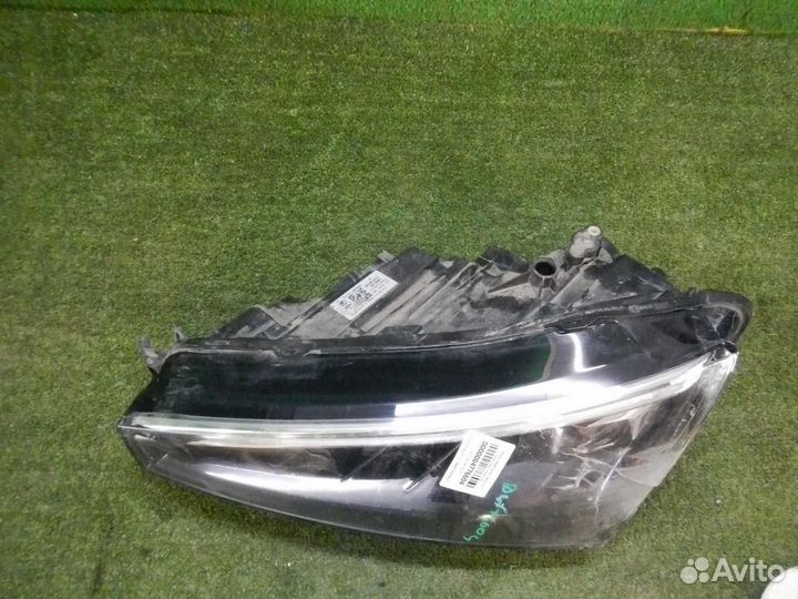 Фара левая Skoda Rapid