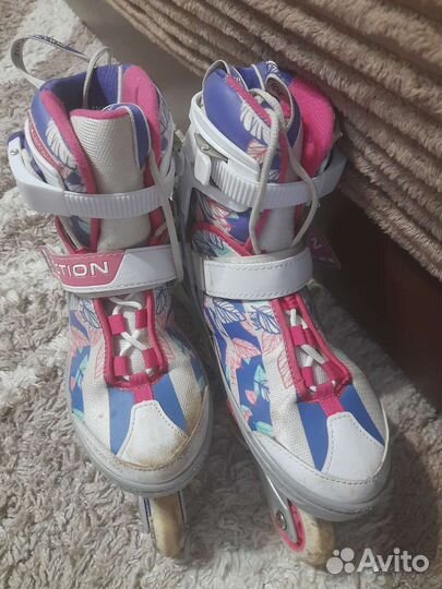 Роликовые коньки