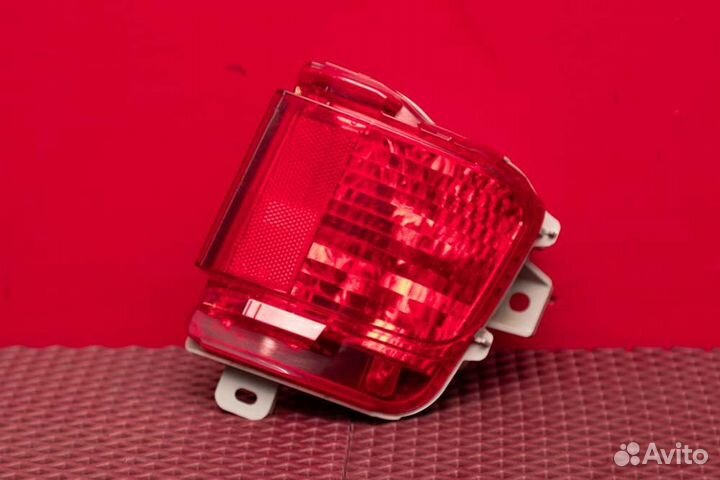 Фонарь противотуманный задний правый Toyota Land