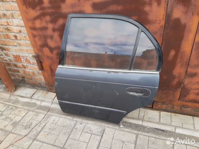 Дверь задняя левая Toyota Corolla Ae100