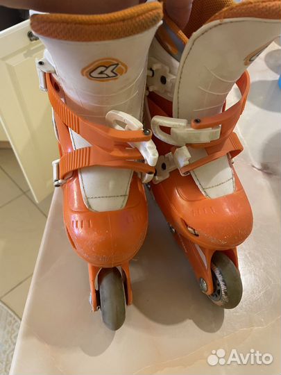 Коньки роликовые