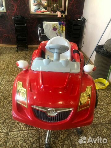 Детское кресло для стрижки детей