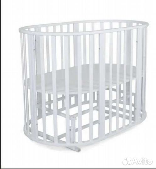 Детская кроватка с маятником