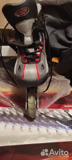 Роликовые коньки