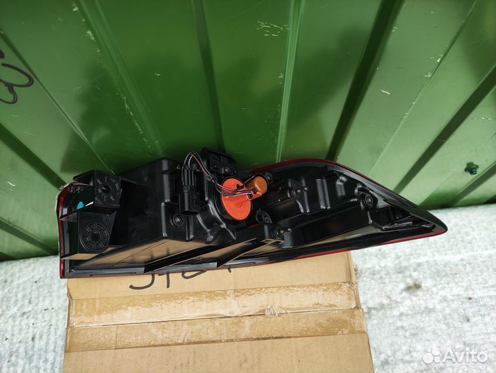 Фонарь задний наружный левый KIA carnival