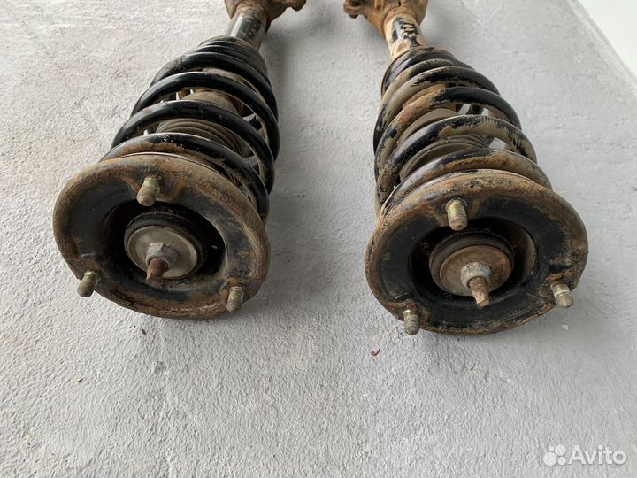 Стойка амортизатора передняя Mitsubishi Galant 7