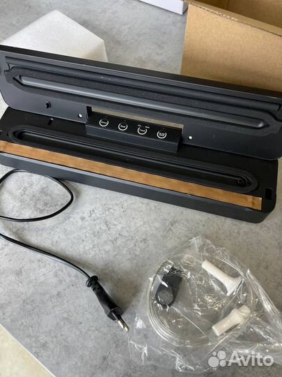 Вакуумный упаковщик