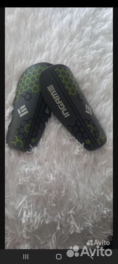 Щитки футбольные