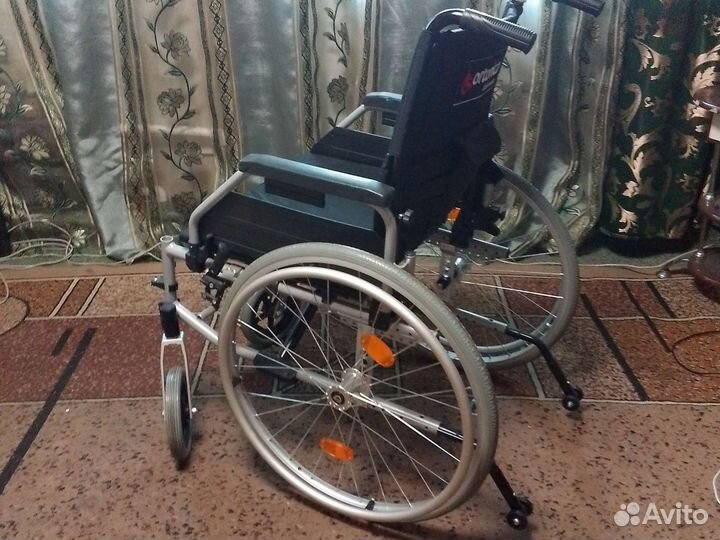 Инвалидная коляска